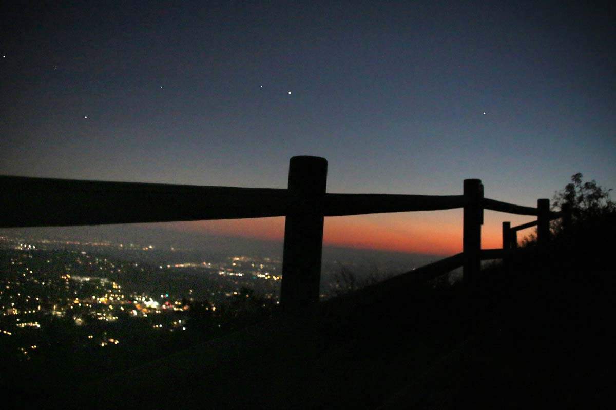 Hike Cowles Mountain at night and not only have the entire mountain to yourself but be greeted by other-worldly views at the top!